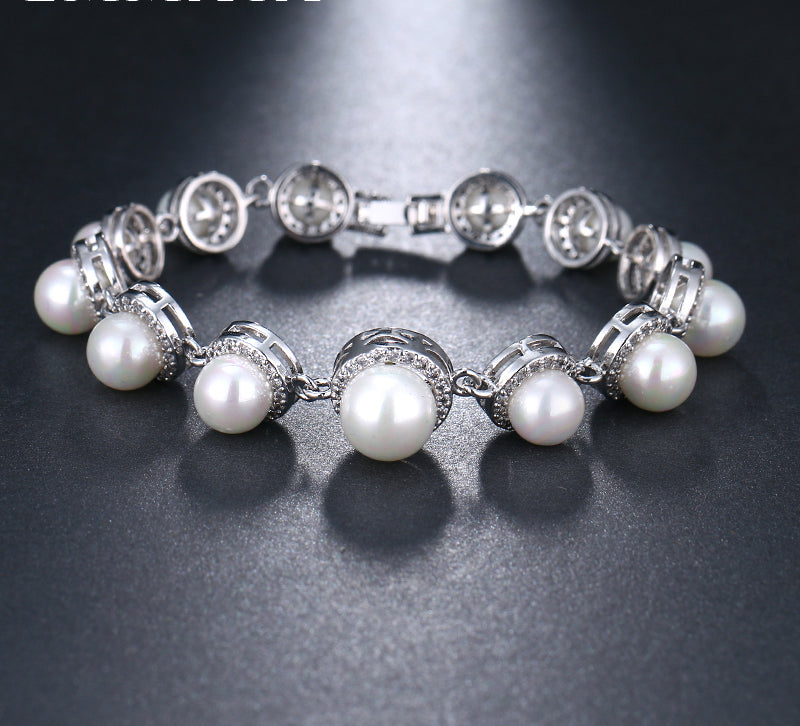 Set In Pearls Simulated Pearls Surrounded by Cubic Zirconia Bridal Bracelet