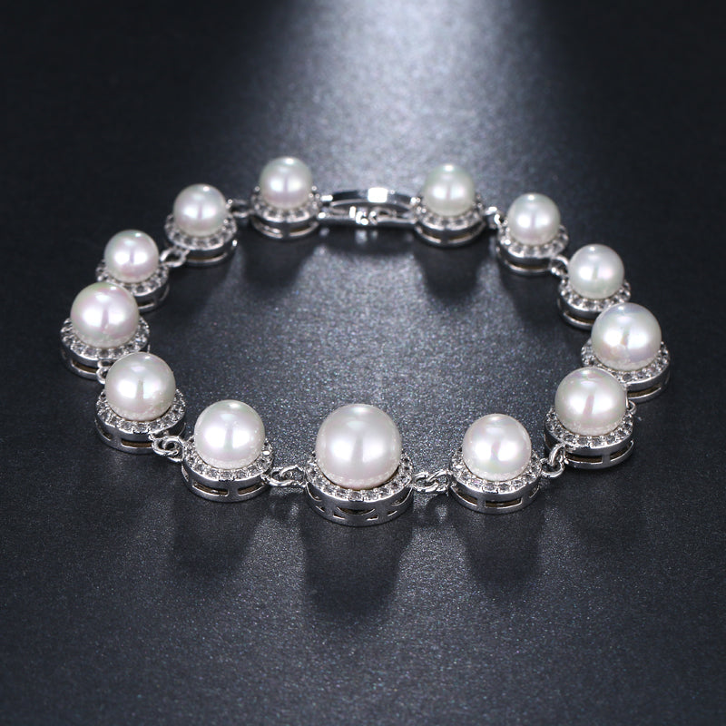Set In Pearls Simulated Pearls Surrounded by Cubic Zirconia Bridal Bracelet